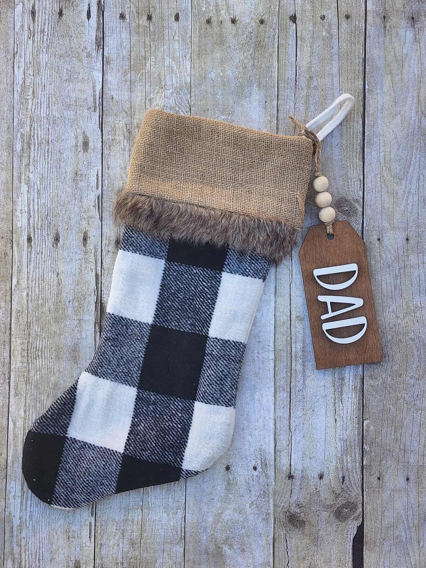 'DAD' tag on wooden background